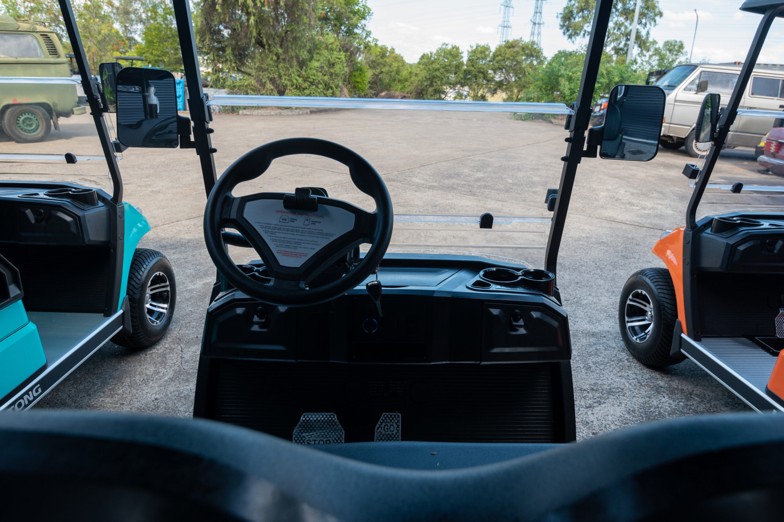 golf cart australia golfers riding between holes enjoying course